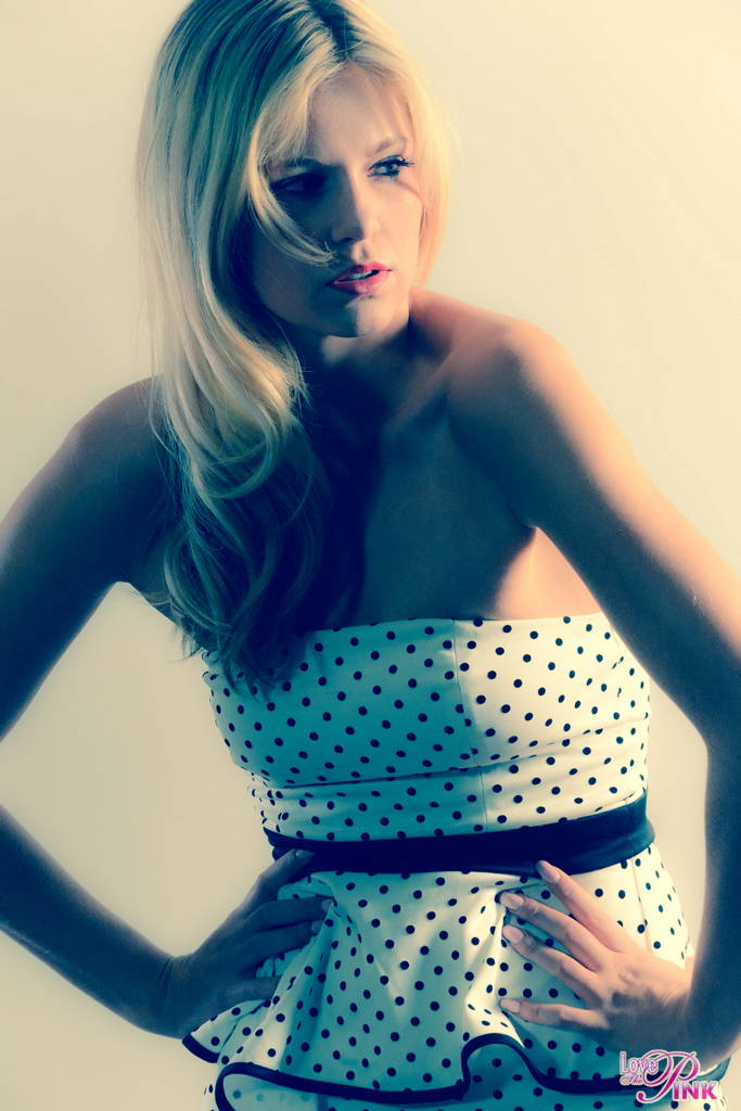 Gorgeous blonde Scarlet Red teasing and slowly undressing on the floor